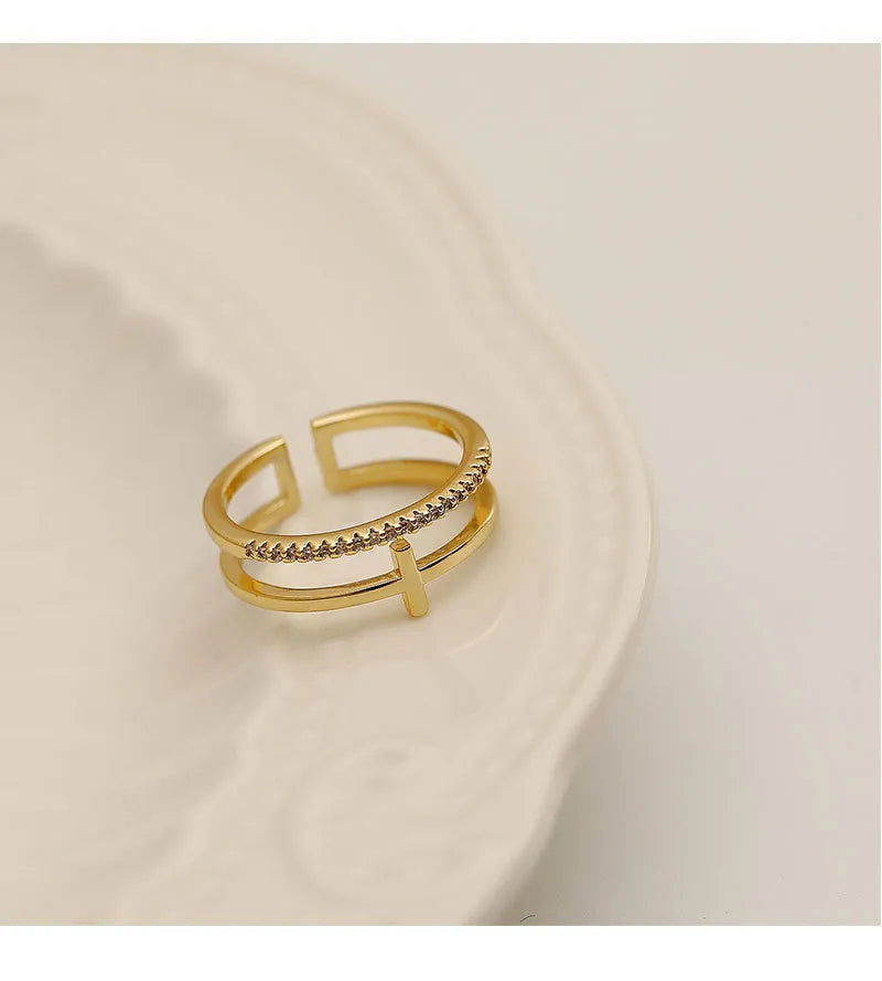 Double Layer Cross Ring with Micro Pave Cubic Zirconia
